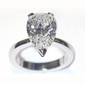 Platinum ring set with a pear cut diamond